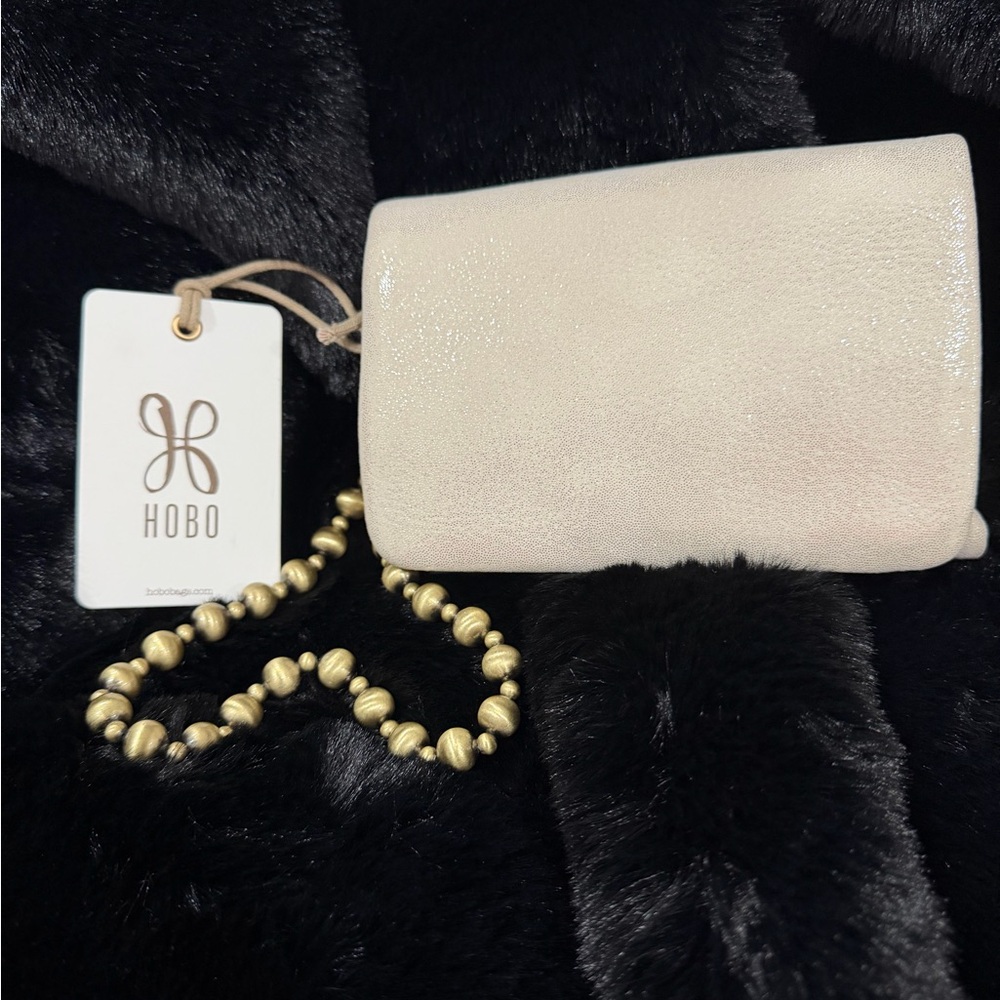 HOBO Cream Clutch with Gold Accents